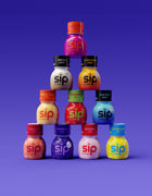 SIP Elixir bottles stacked in a pyramid including Sunset Punch, Xpresso, Citrus Spark, Tropical Crush, Watermelon, Blue Razz, Hurricane, Dreamberry, Wild Berry and Electric Lemon