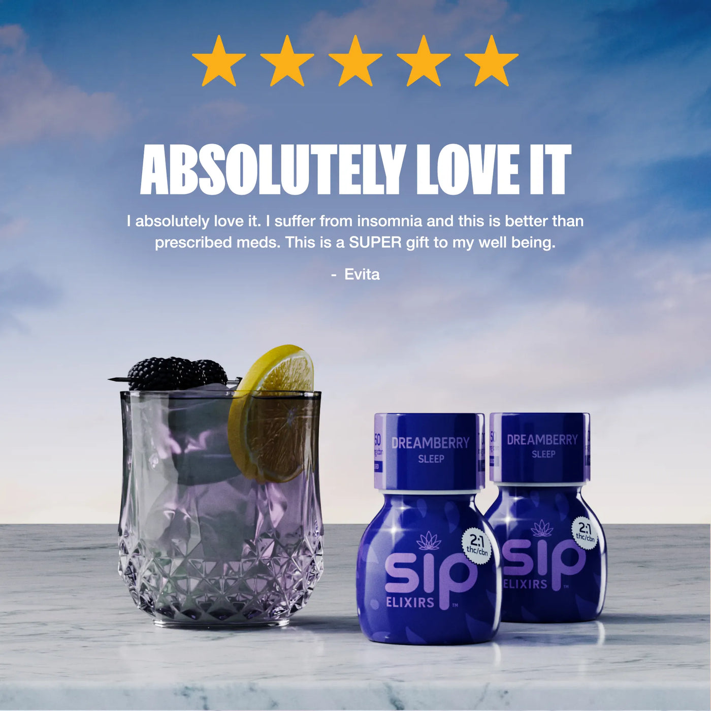 Two bottles of Sip Elixirs with a glass of liquid and garnish on a wooden surface with a blue sky background.